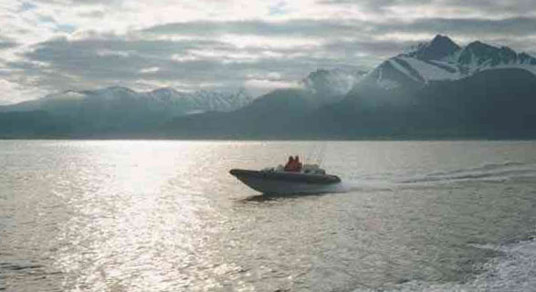 Charles and Joyce in their rigid hull inflatable boat.